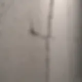 Close-up of a hairline crack in drywall