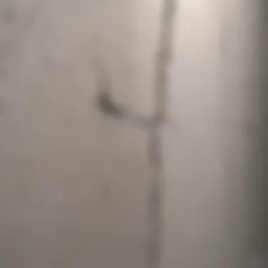 Close-up of a hairline crack in drywall