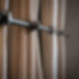 Various types of curtain rod hangers on display