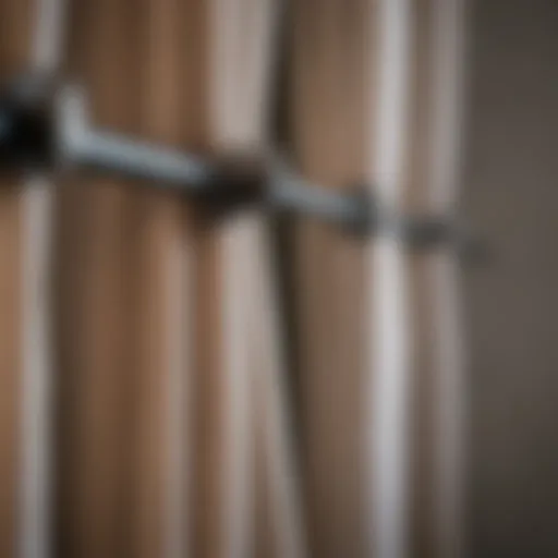 Various types of curtain rod hangers on display