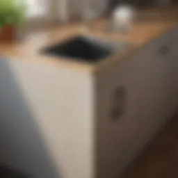 Eco-friendly kitchen waste bin with recycling symbols
