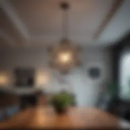 A striking geometric pendant light illuminating a modern dining area