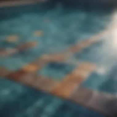 A close-up of beautiful pool tiles reflecting sunlight