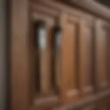 Close-up view of wooden cabinet doors with paintbrush and color palette