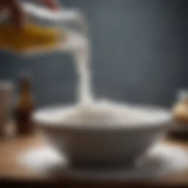 Salt being poured into a bowl with vinegar